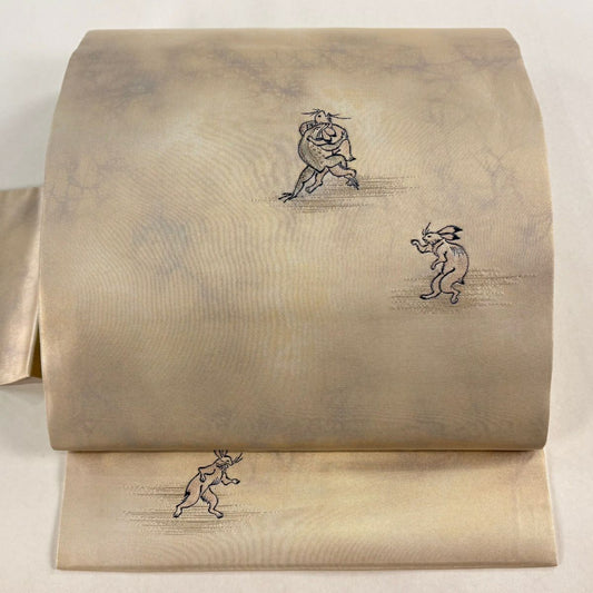 【美品】 名古屋帶 逸品級 附有落款 鳥獸戲畫 金金箔 淺茶 純蠶絲