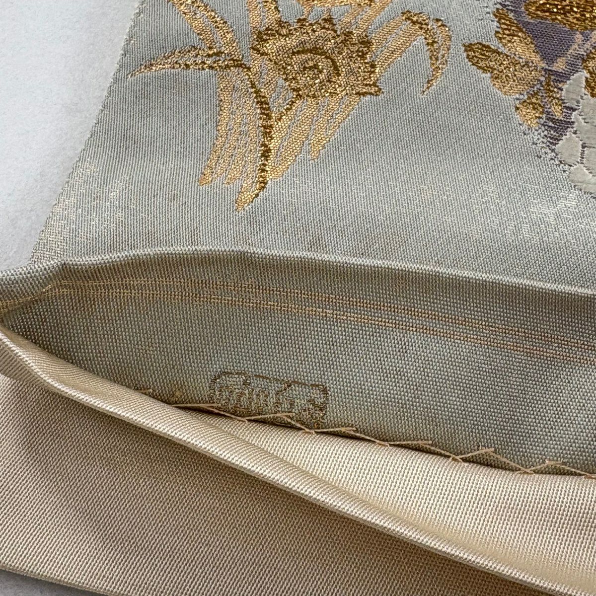 袋帶 名品級 じゅらく 落款あり 帝王紫 華紋 向かい鳥 金金箔 金絲 米色 大鼓圖案 純蠶絲