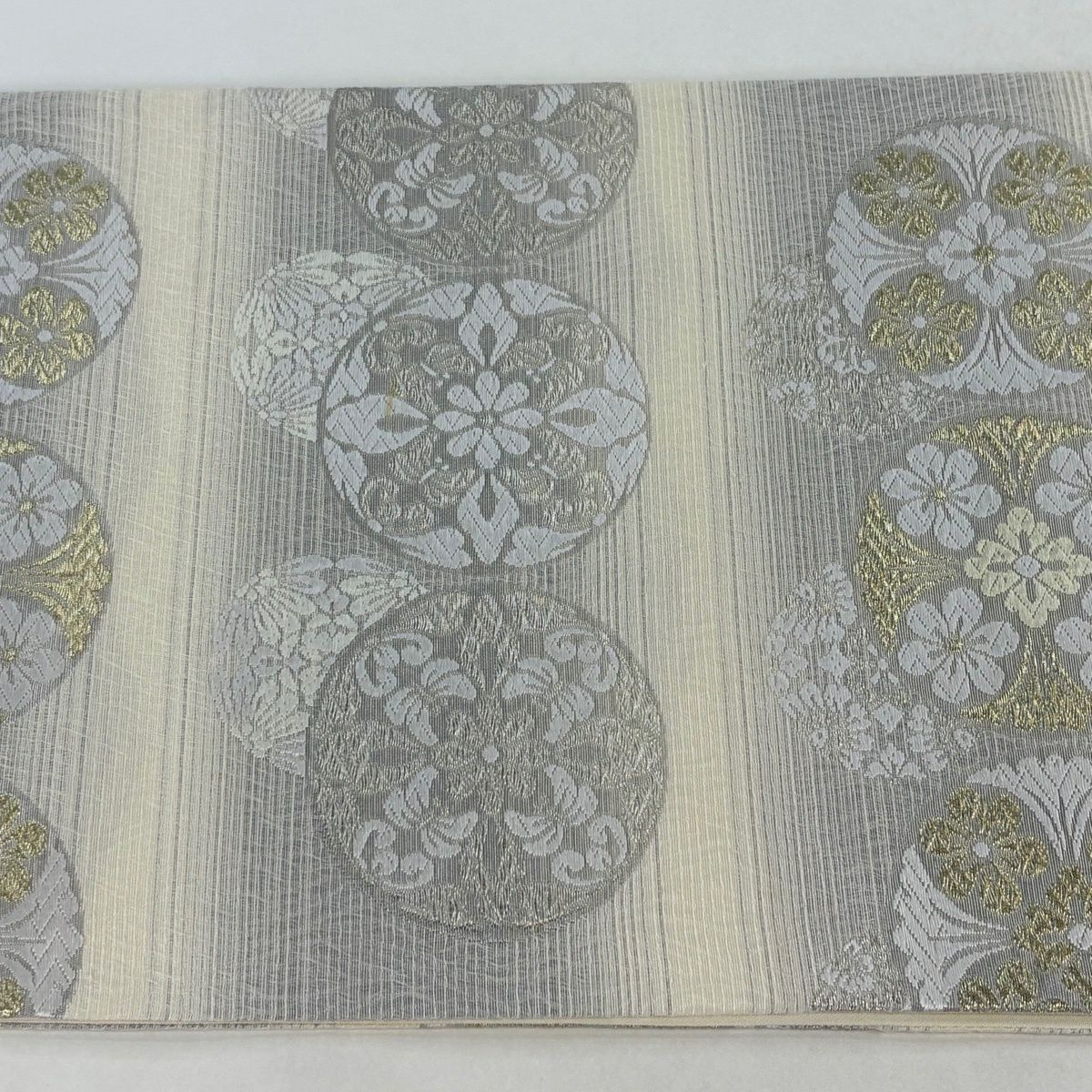 【美品】 袋帶 逸品級 新小石丸 草木染 草花紋紋 浮線綾文樣 金絲 奶油 六通 純蠶絲