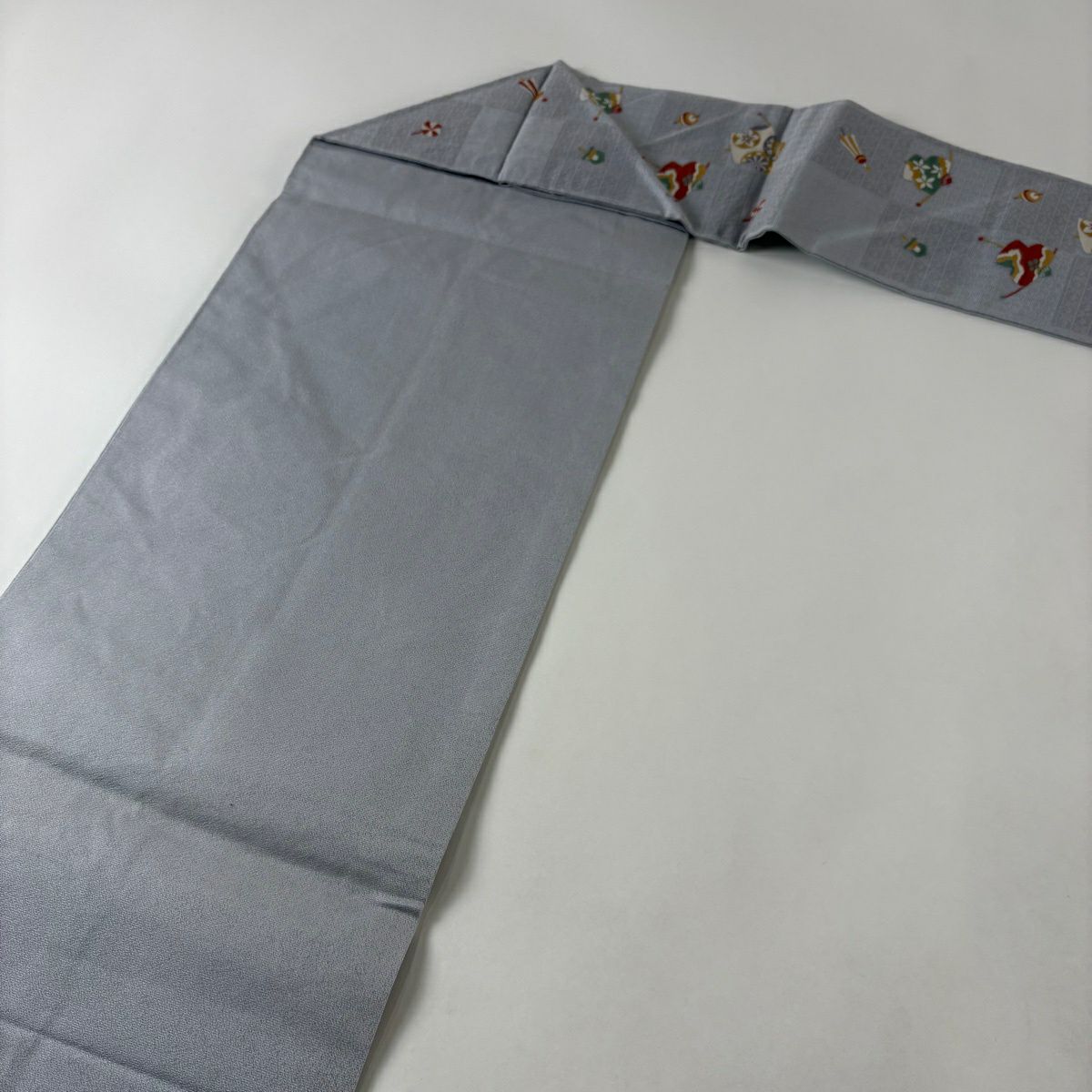 【美品】 名古屋帶 名品級 風車 独樂 灰色 純蠶絲