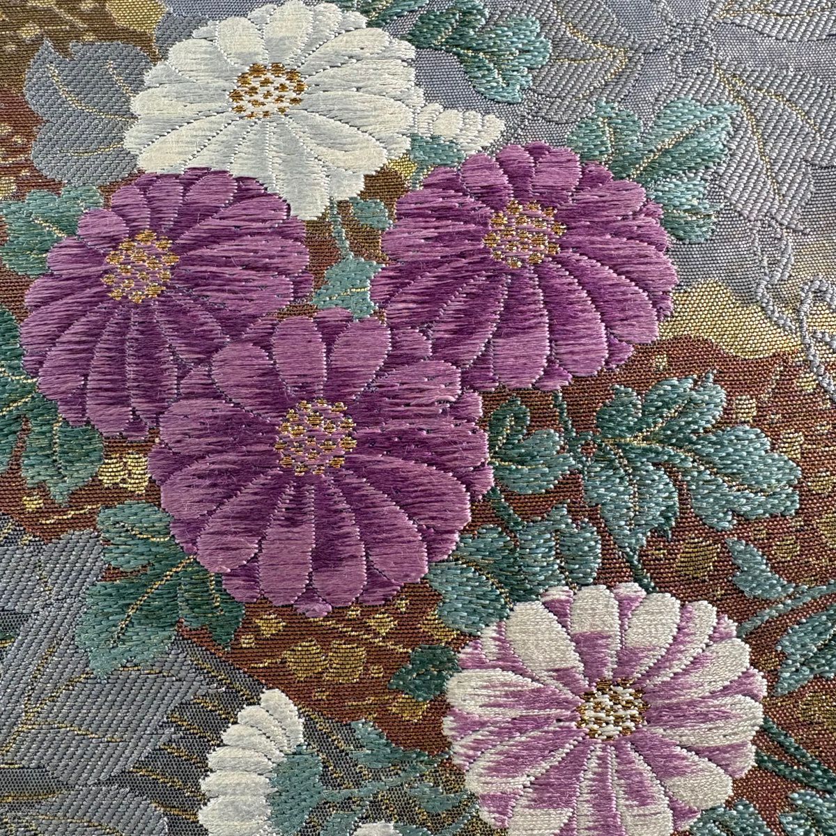 袋帶 逸品級 じゅらく 落款あり じゅらく帝王紫 菊花 仙鶴 金糸 金金箔 金茶 お太鼓柄 純蠶絲