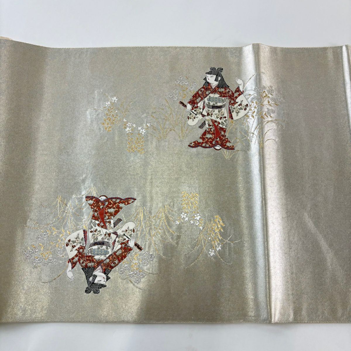 【美品】 袋帶 逸品級 長嶋成織物 落款あり 瀞銀錦 由水十久 童 草花紋紋 金金箔 銀 お太鼓柄 純蠶絲