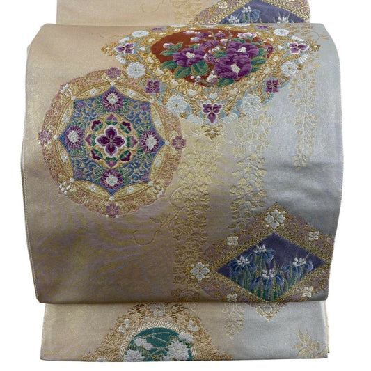 袋帶 名品級 じゅらく 落款あり 帝王紫 華紋 草花紋 唐織 金糸 金色 お太鼓柄 純蠶絲