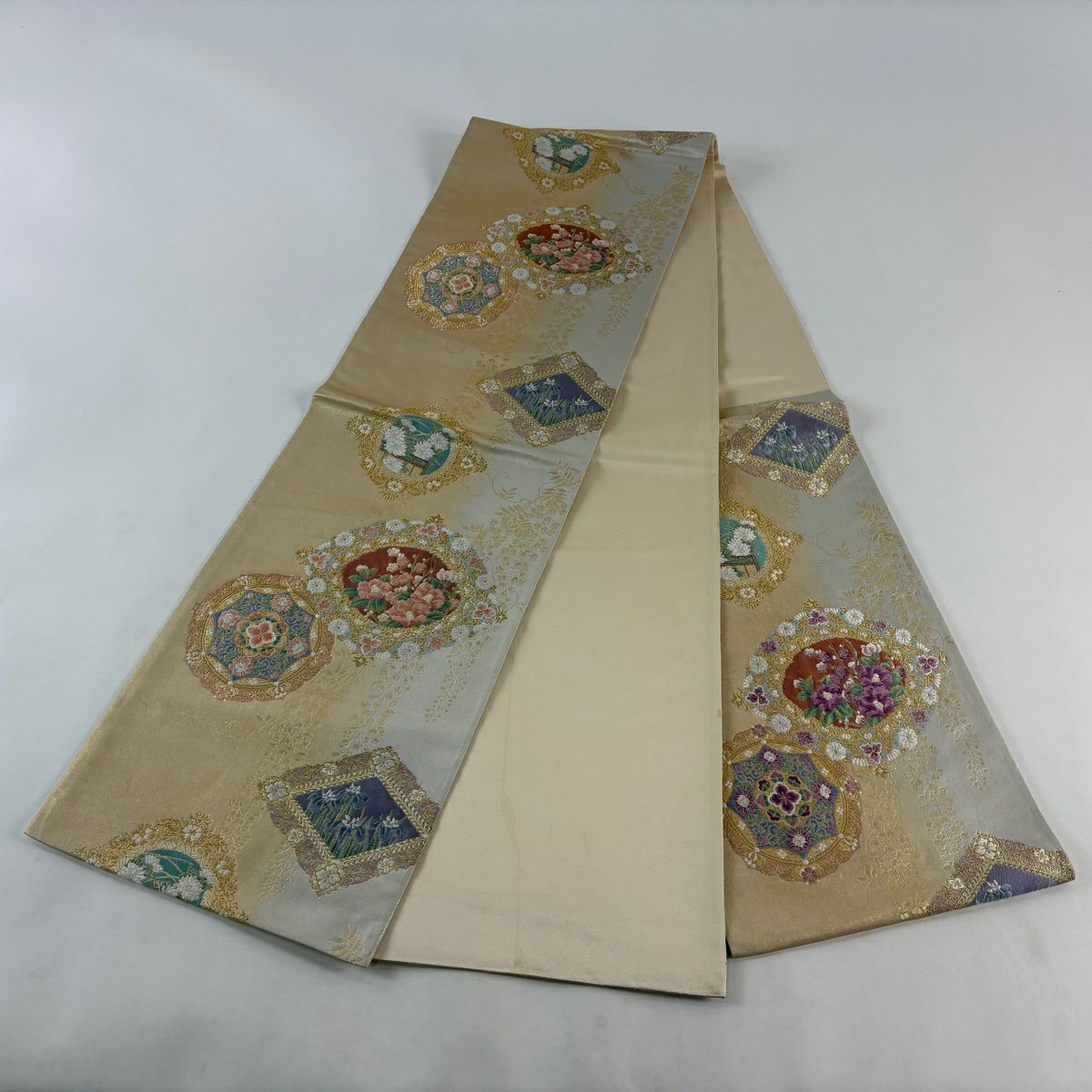 袋帶 名品級 じゅらく 落款あり 帝王紫 華紋 草花紋 唐織 金糸 金色 お太鼓柄 純蠶絲