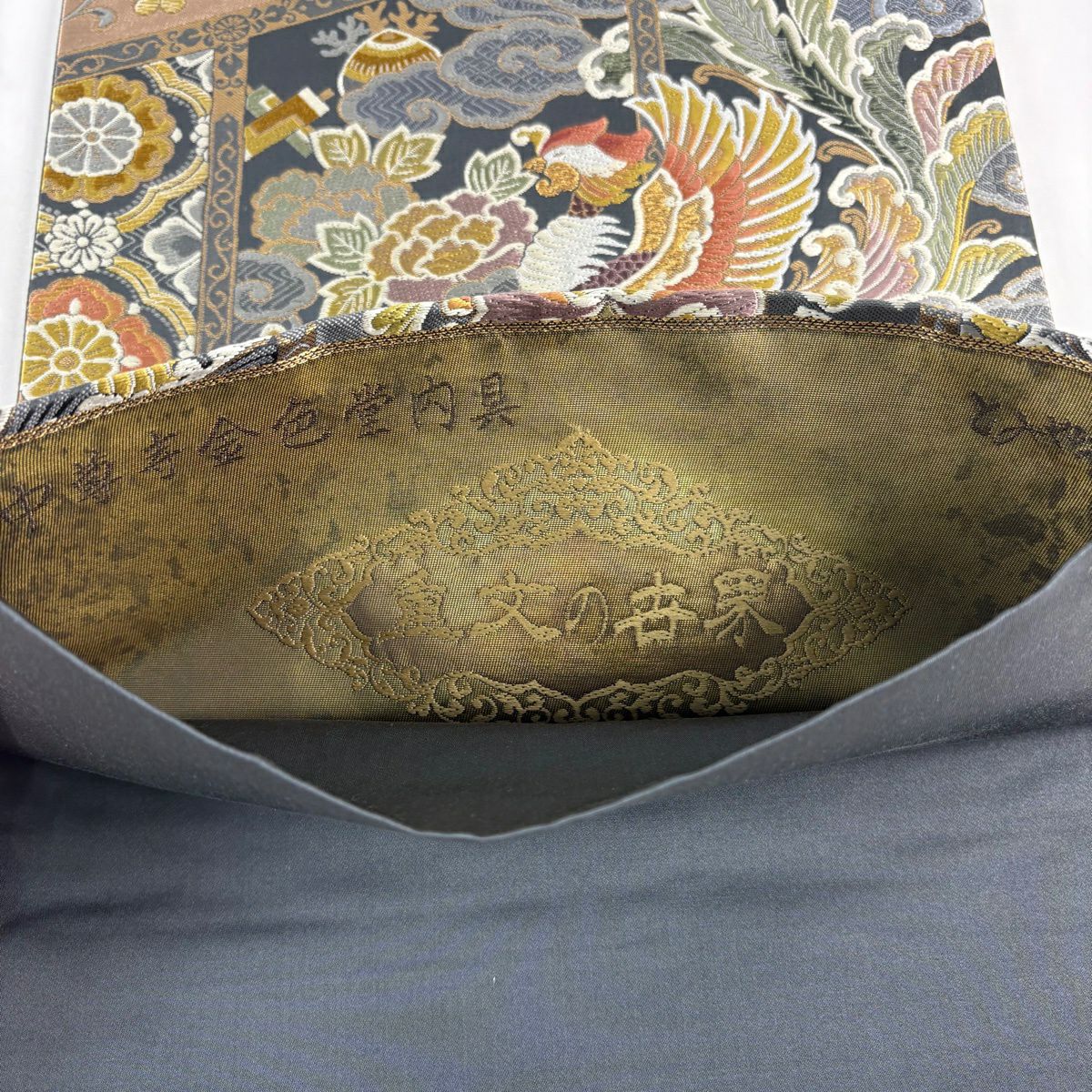 【美品】 袋帶 名品級 富屋織物 落款あり 重文的世界 中尊寺金色堂內具 鳳凰 草花紋唐織 金金箔 墨 六通 純蠶絲