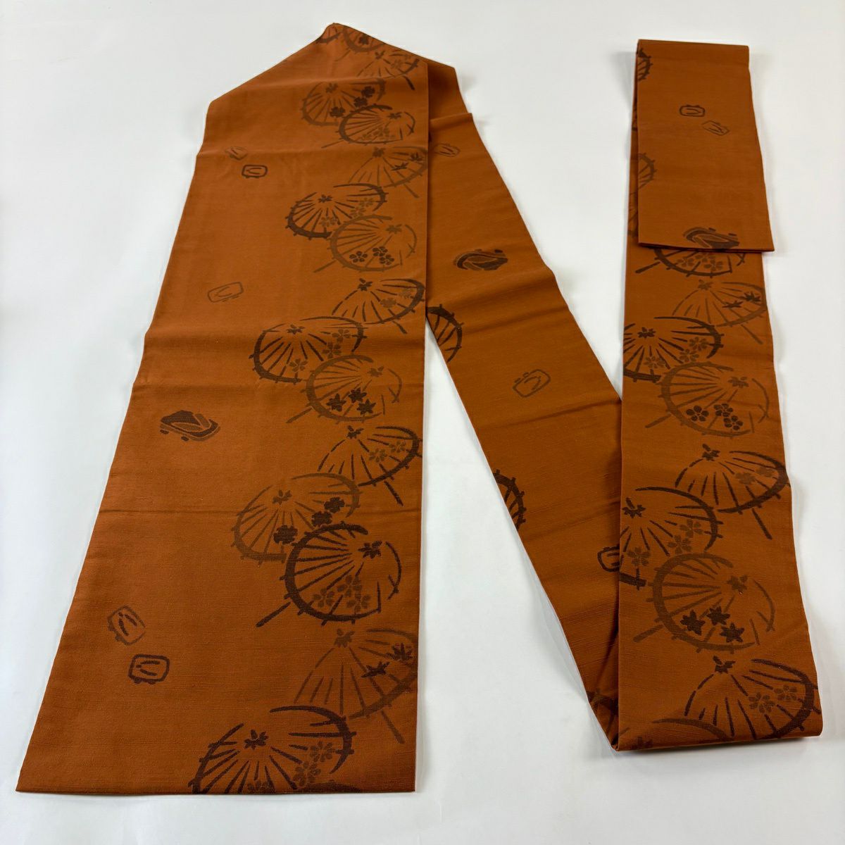 【美品】 名古屋帶 秀品級 紬織織 傘 下駄 茶 純蠶絲