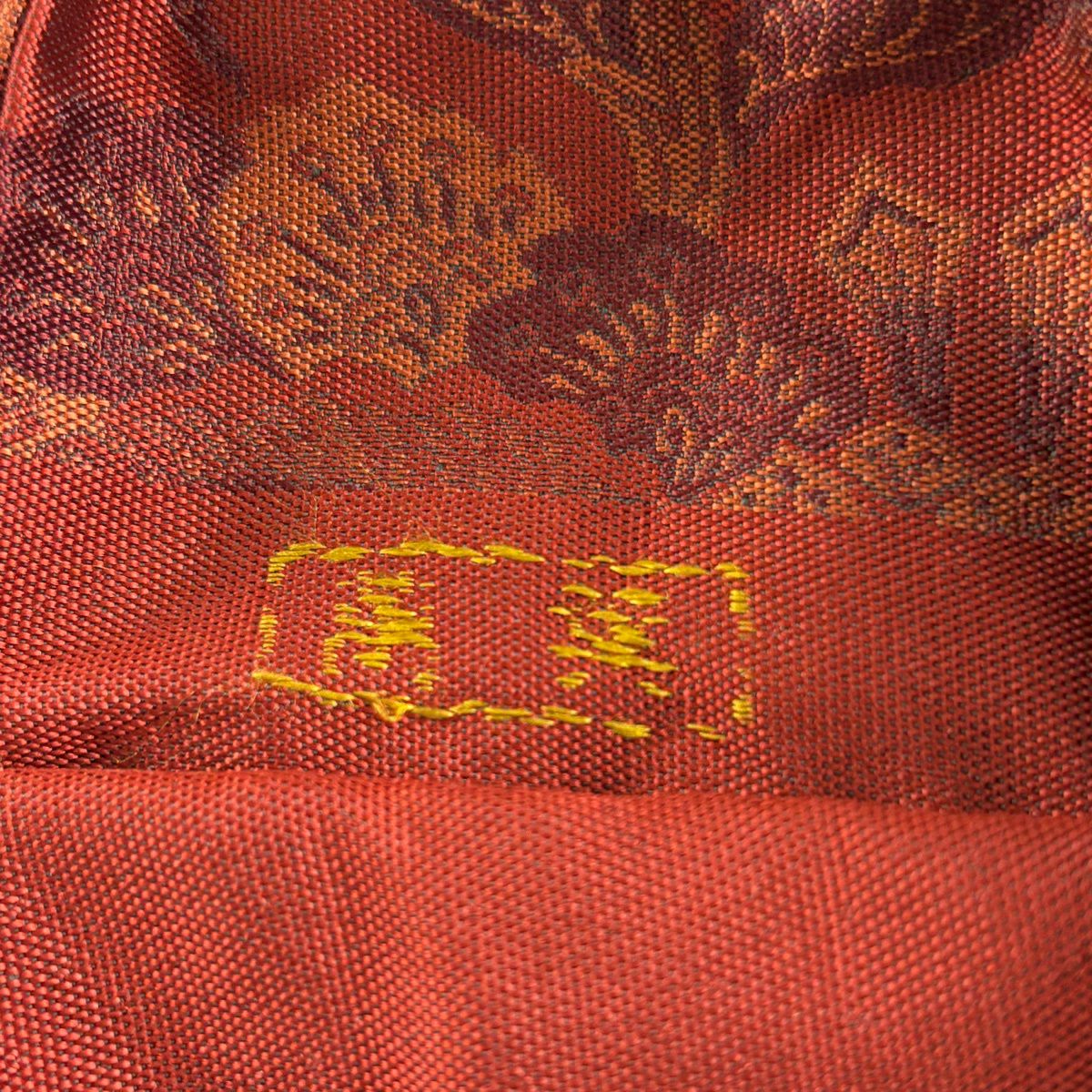 【美品】 名古屋帶 秀品級 落款あり 萬葉 花唐草紋 深紅 純蠶絲