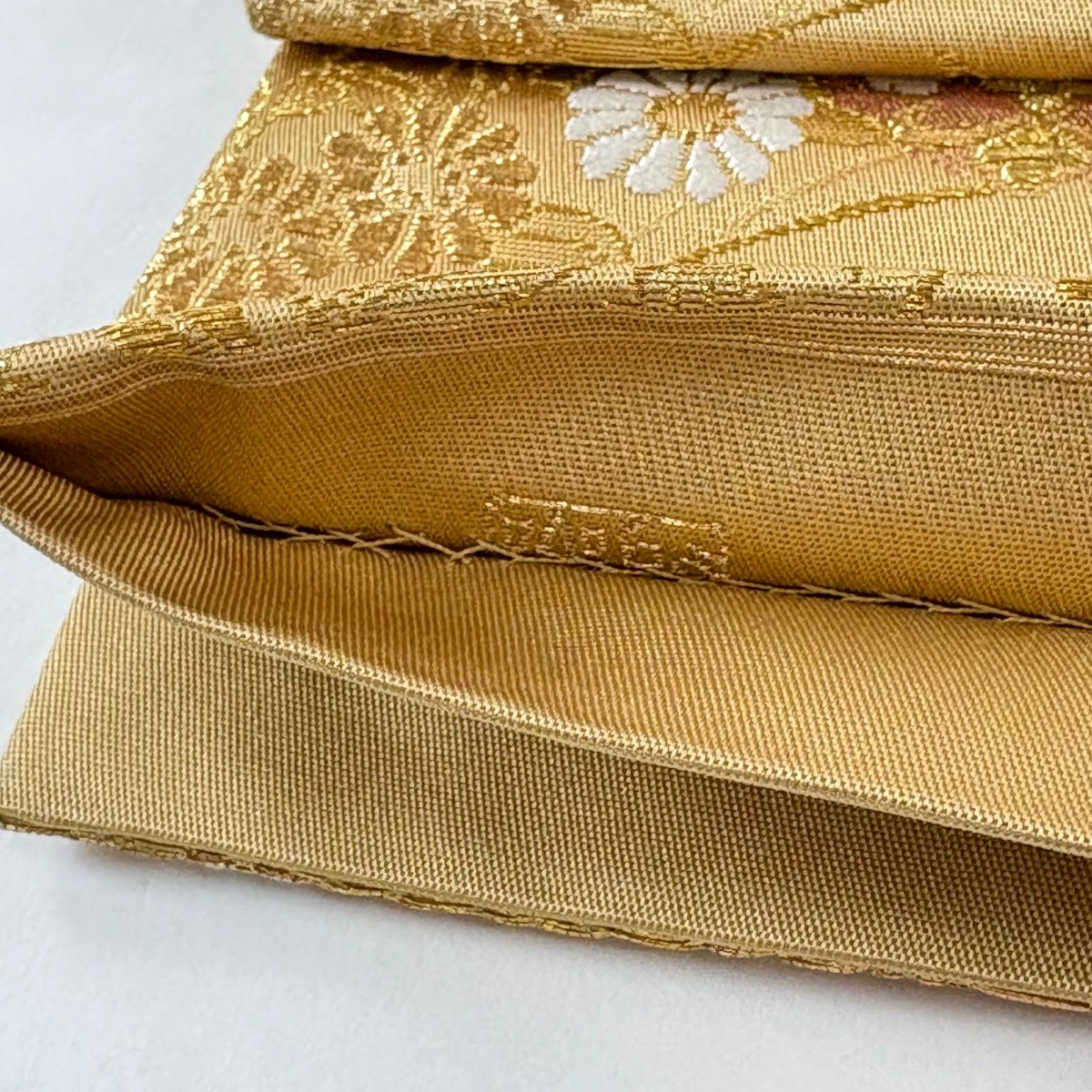 袋帶 逸品級 じゅらく 落款あり 証紙あり 鳳凰 草花紋刺繡 金線 米色 お太鼓柄 純蠶絲